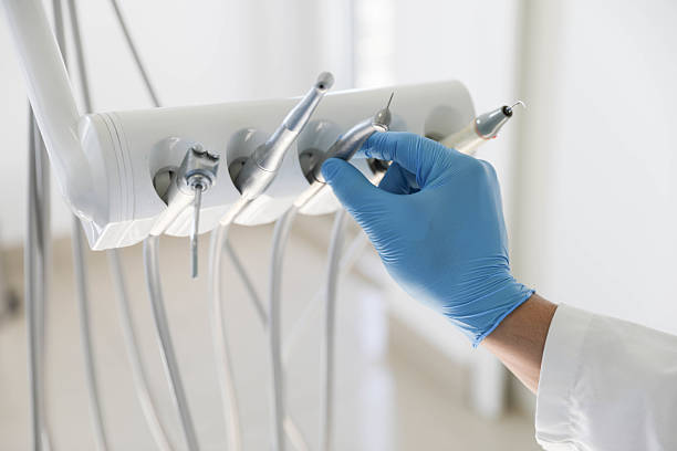 Professional Tooth Extraction technician working in Camp Hill, AL